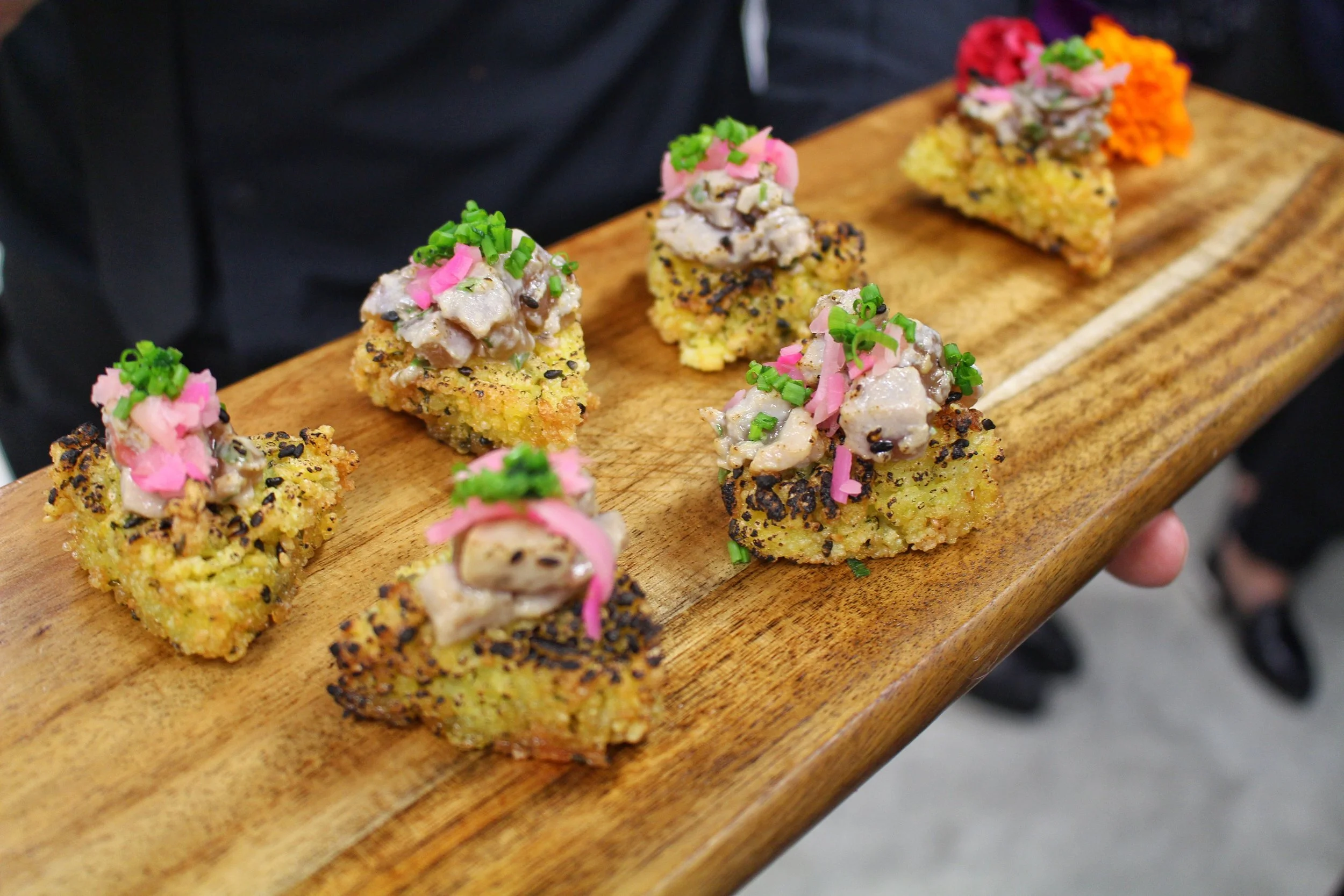 Torched Tuna Tartar on top of Pan Fried Sushi Rice Cake w. Pickled Ginger and Chives