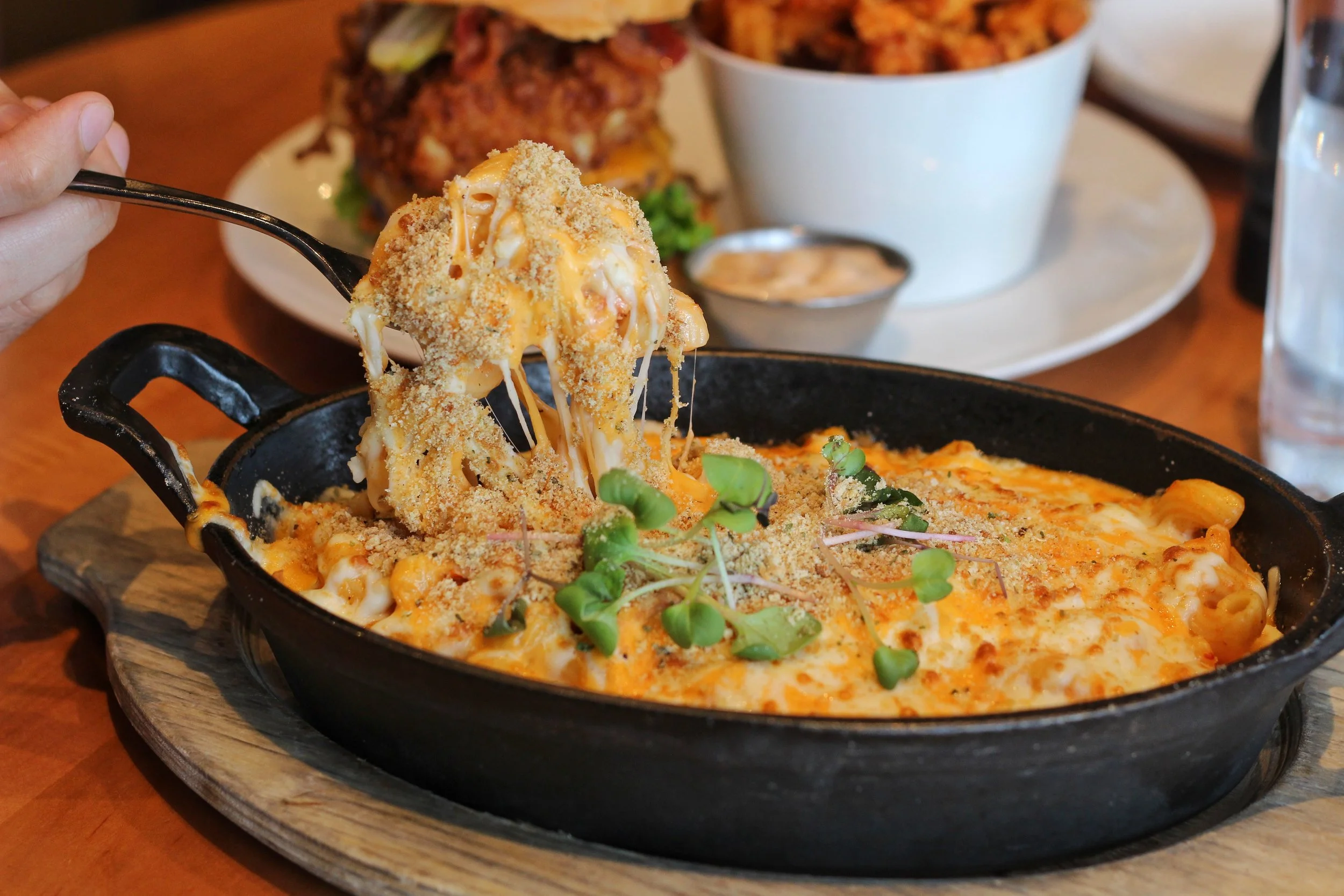 Lobster Mac & Cheese – tomato cheese sauce, Atlantic lobster, pico de gallo, herb crusted