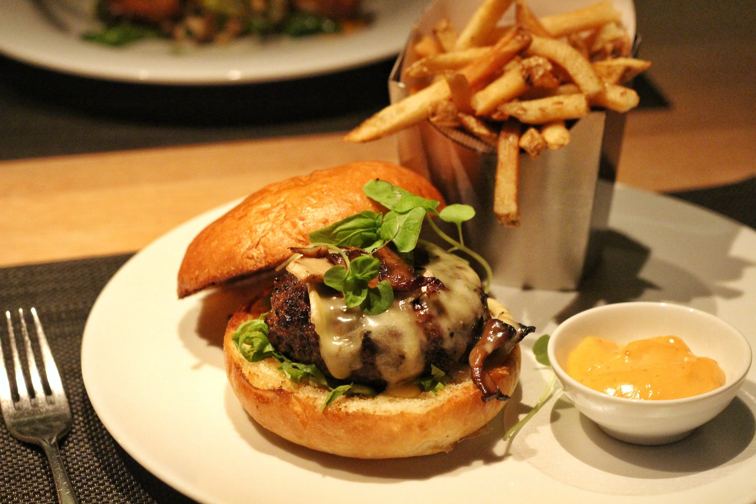 Bymark 7oz Burger - brie, sauteed mushrooms, truffle aioili, crisp frites