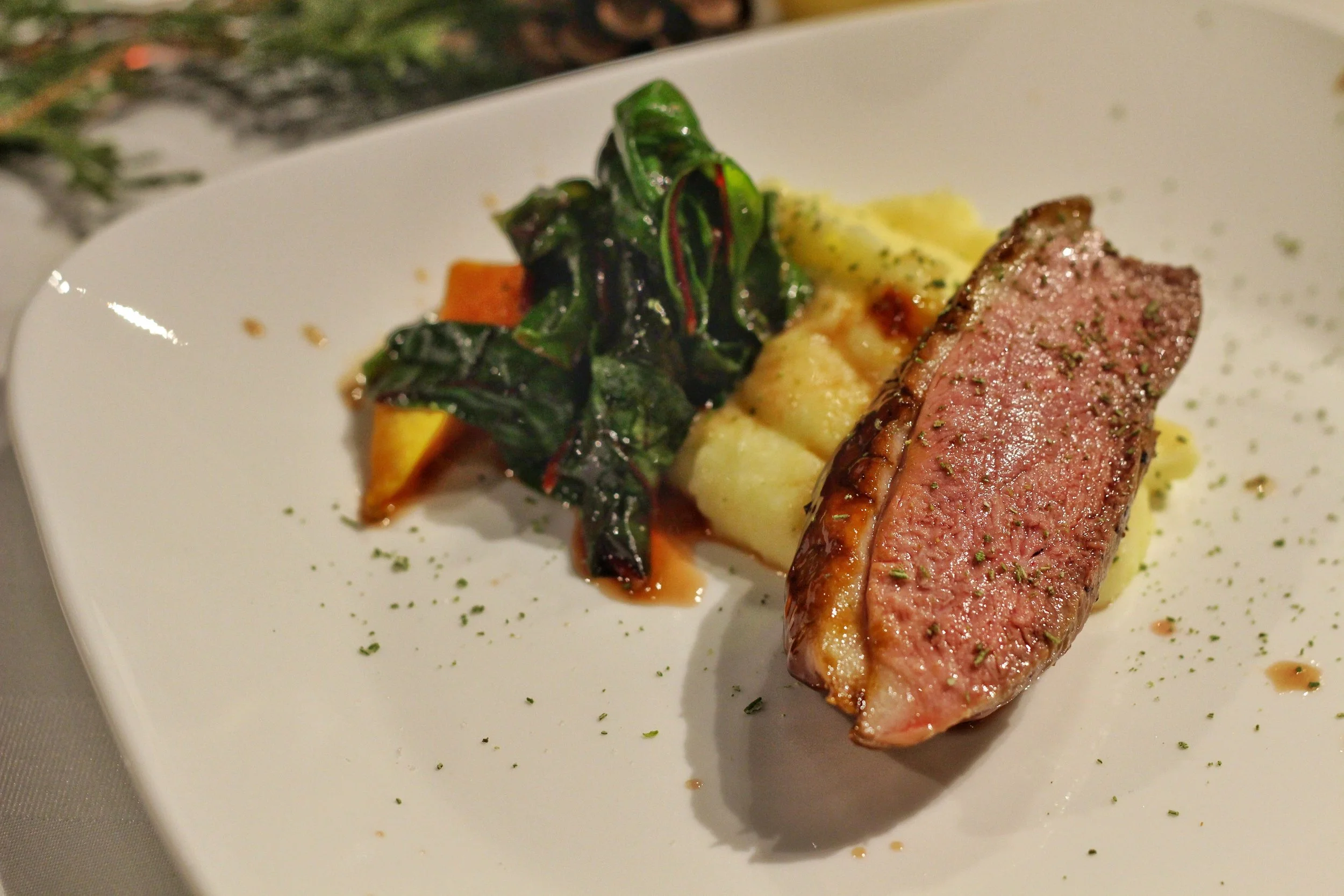 King Cole Farms Seared Duck Breast - Garlic Mashed Potatoes, Roasted Acorn Squash, Grapes, Swiss Chard, Verjus & Rosemary Powder