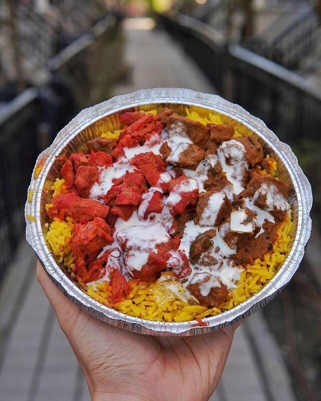 This is my comfort food right here! A &quot;Fusion Shawarma Biryani Plate&quot; from @samosahut which includes half butter chicken and half mango pineapple chicken topped with their signature garlic sauce. Perfect for those lazy takeout days... Like 
