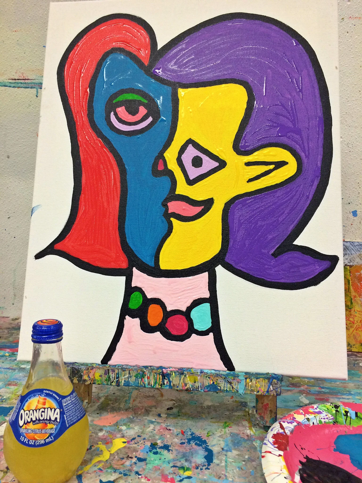 My final Picasso self-portrait and Orangina, my favorite French orange drink.