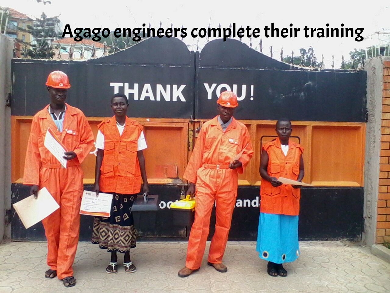 Technicians from Agago show off their certificates after training.jpg