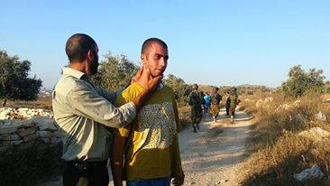 Zoon van man nadat kolonisten hem mishandelden met de hulp van Israëlische soldaten.
