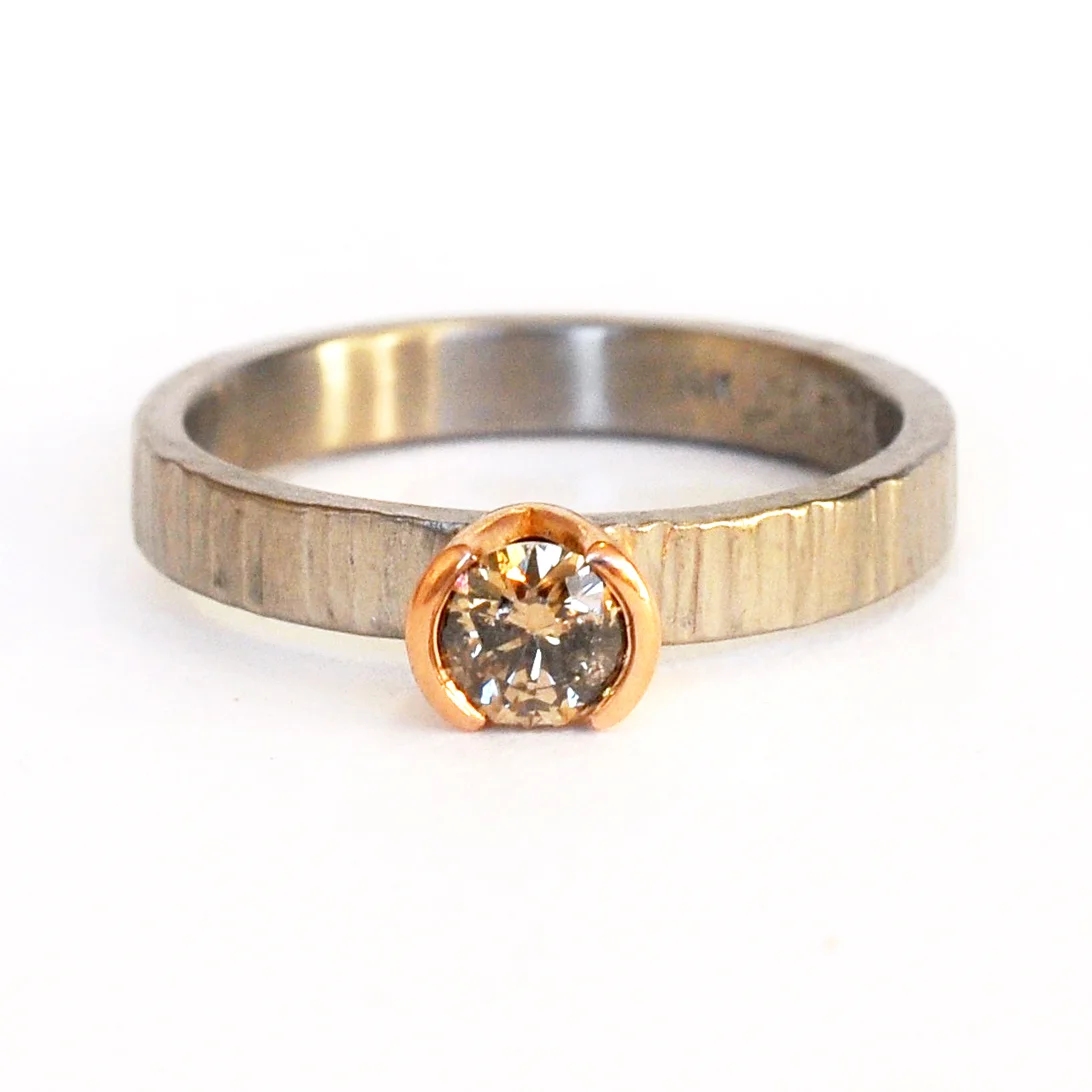 Deep Champagne brilliant solitaire in mixed metals of 14k red gold and linear hammered 500 palladium recycled metals conflict free stones Minneapolis handmade custom rings alternative bridal
