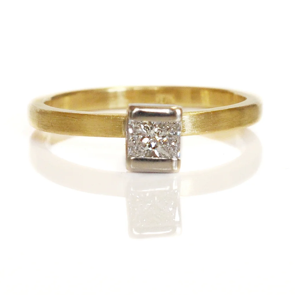 brilliant princess cut white diamond solitaire ring in a 14kw gold V bezel, and 18k yellow gold satin band recycled metals conflict free stones Minneapolis handmade custom rings alternative bridal