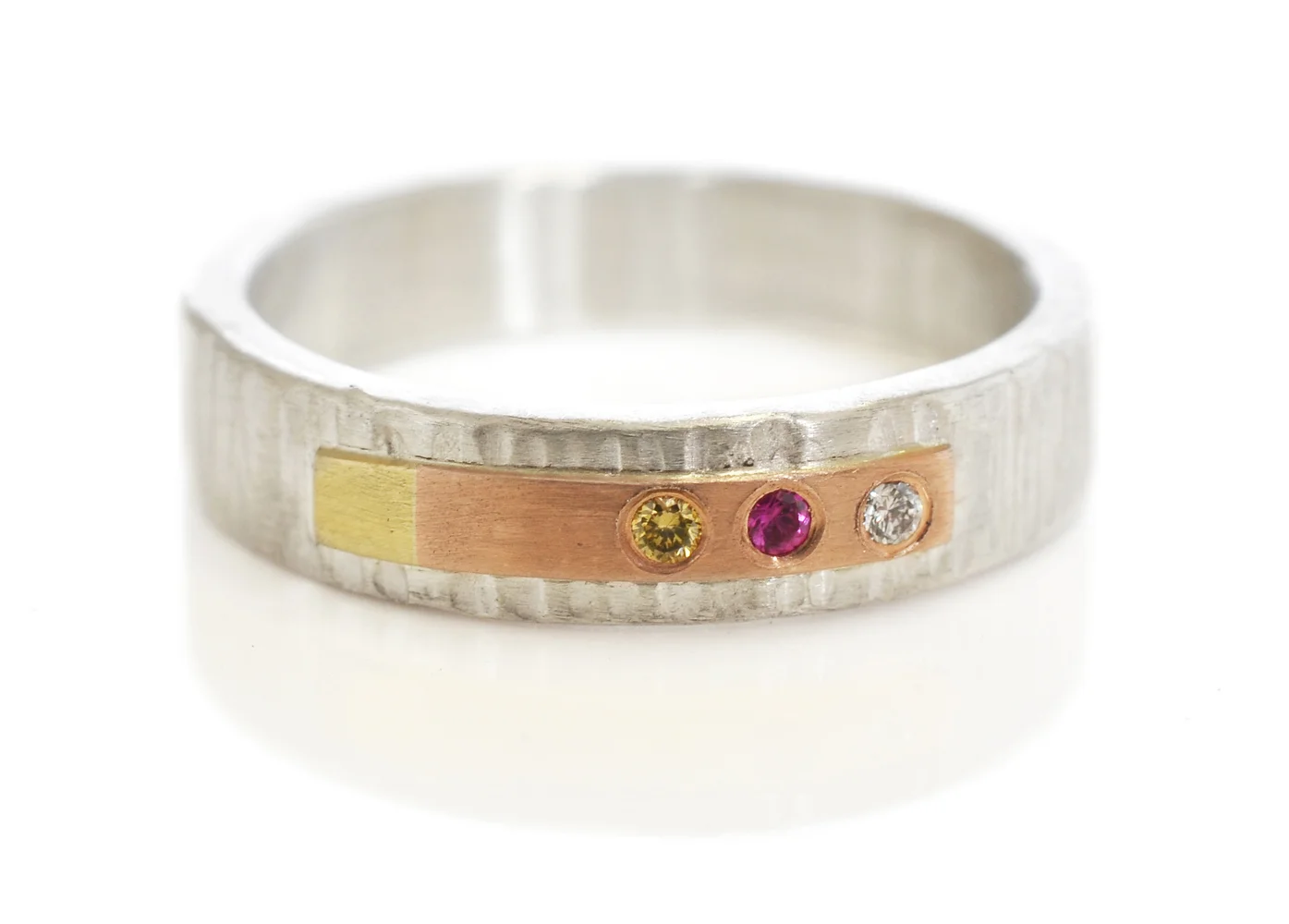 Facere-custom-rivet-ring-linearHammered-sterlingsilver-14kredrosepinkGold-18ky-coloredDiamonds2.jpg