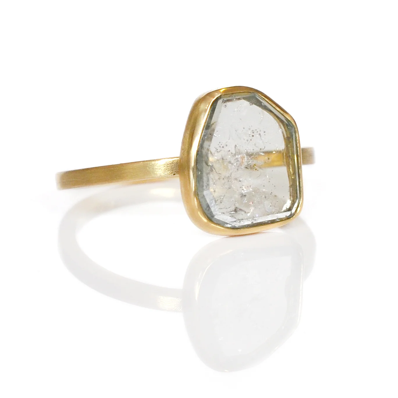18k yellow gold blue green montana sapphire slice open back solitaire modern minimal asymmetrical alternative wedding engagement commitment cocktail ring ec design ethical minnesota custom jewelry