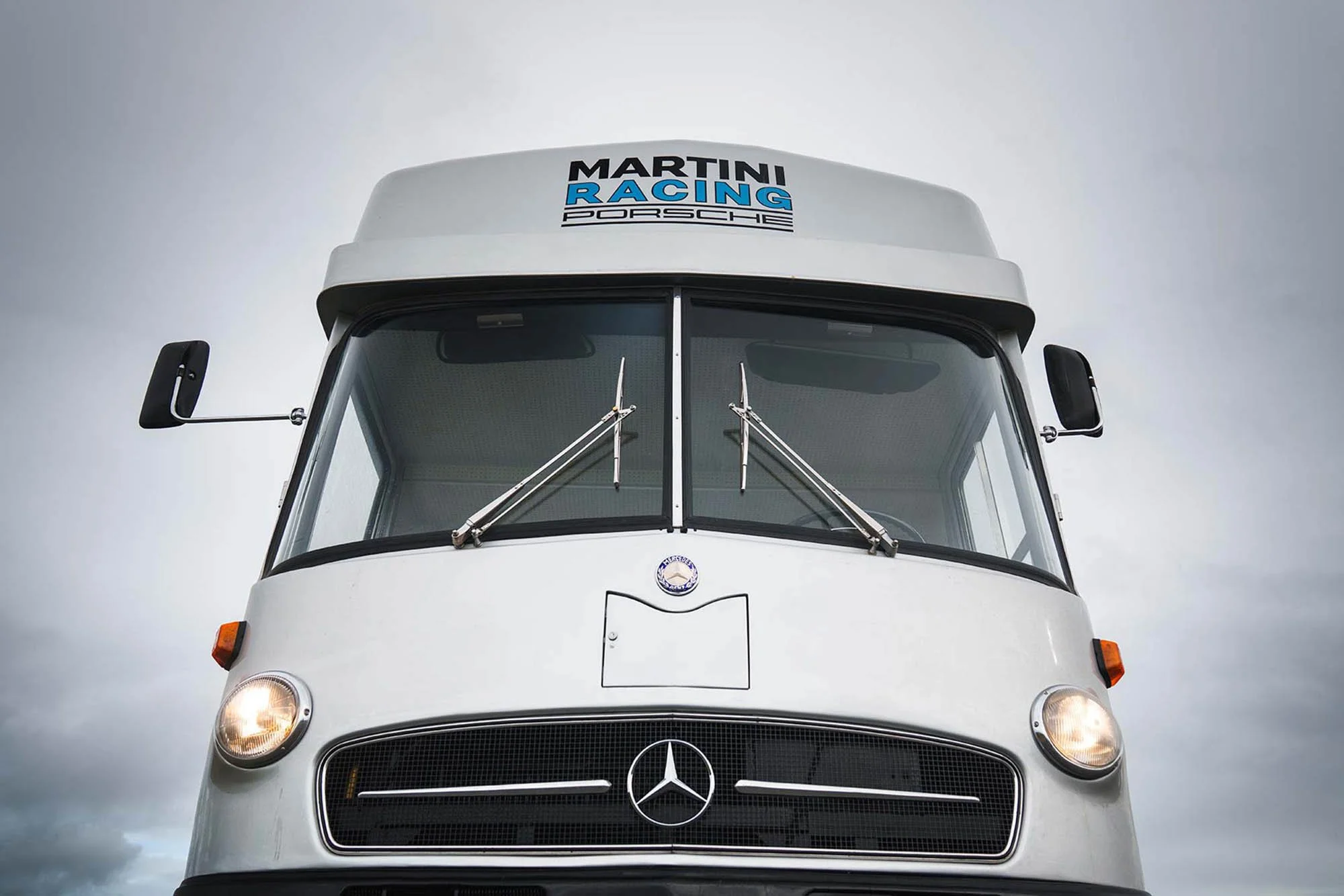 6a4144379aa69b533bf0fb92_11-1975-mercedes-benz-o317-porsche-renntransporter.jpg