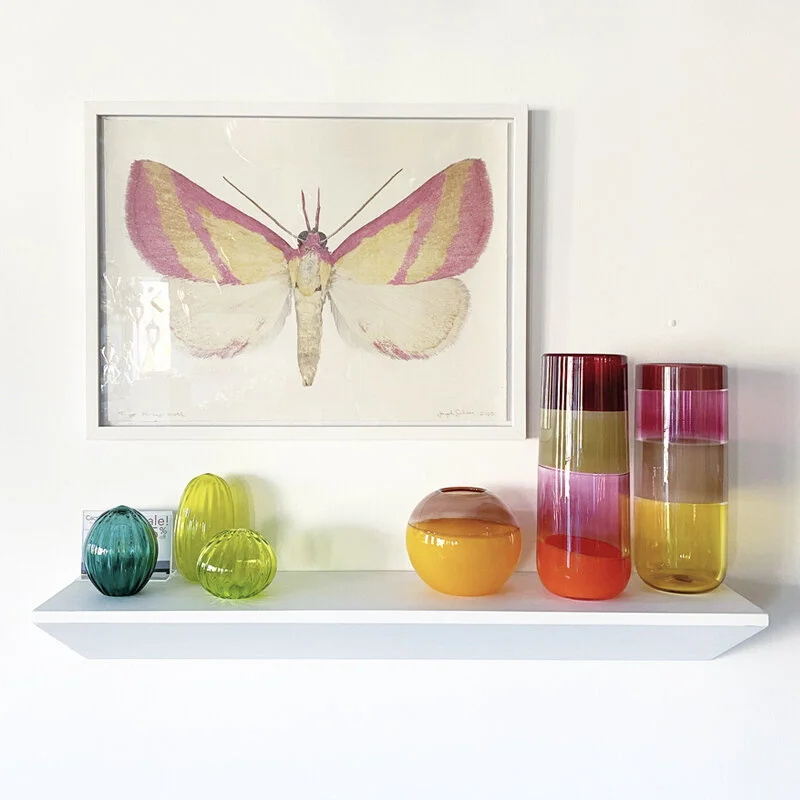 Striped Cylinders on shelf.jpg