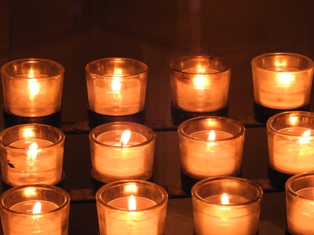 Lighting candles at the Cathedral