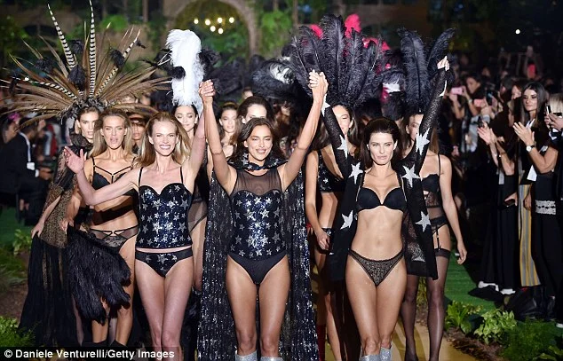 Irina Shayk leaves NOTHING to the imagination as she slips her curves into sheer lace lingerie while strutting down Intimissimi runway in Italy