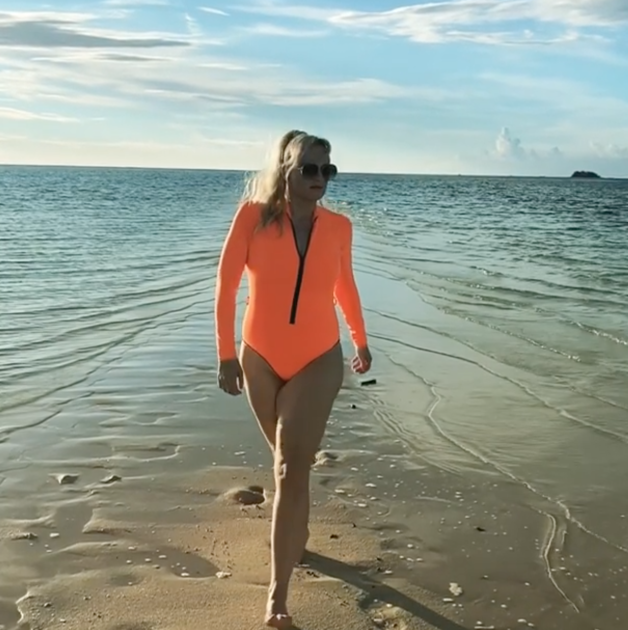 Rebel Wilson Wears an Orange Swimsuit in New Instagram Photo—And Shares the Motivation Behind Her Weight Loss