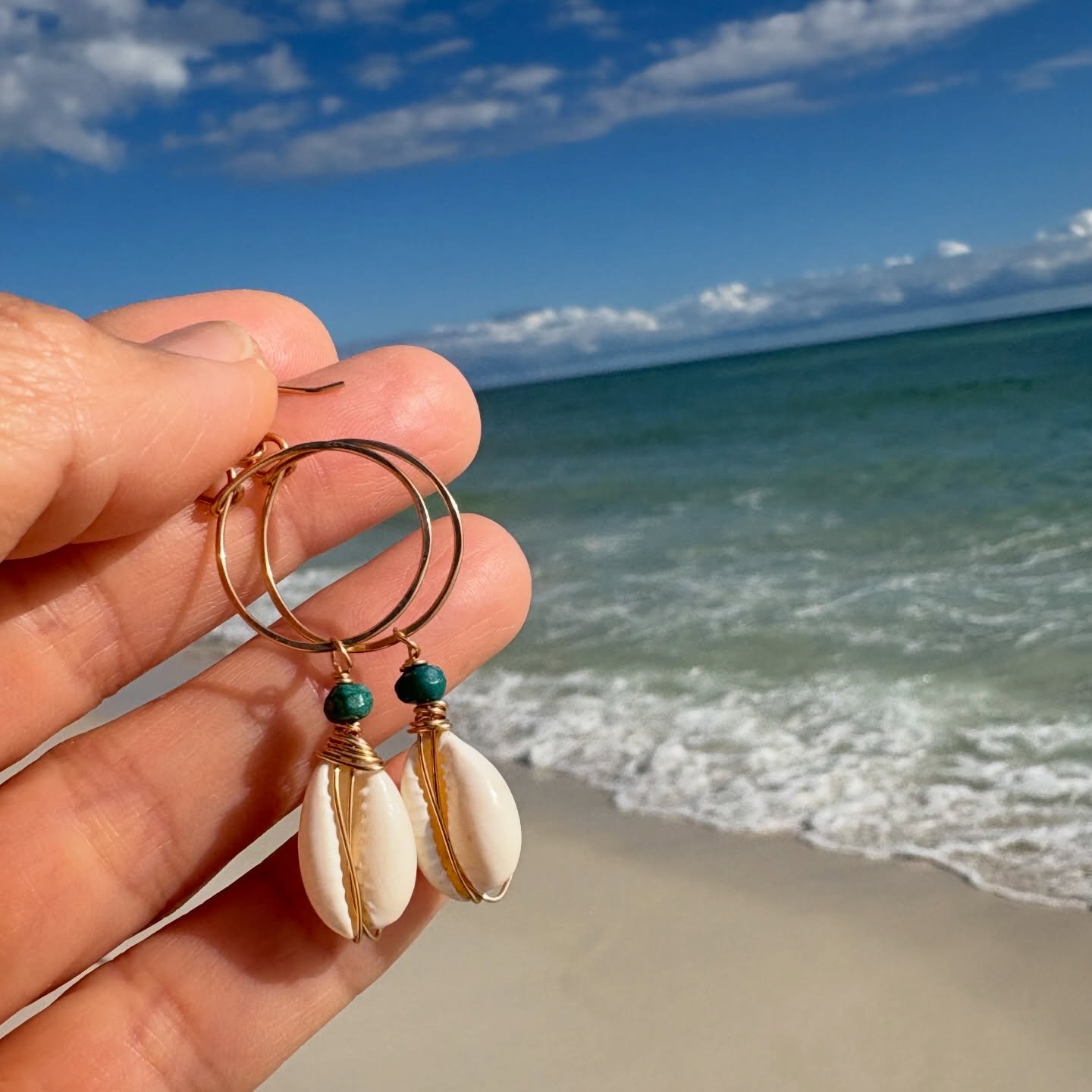 Cowrie shell earrings just restocked in Santa Cruz. The perfect little accessories to get you beach-ready @zenisland