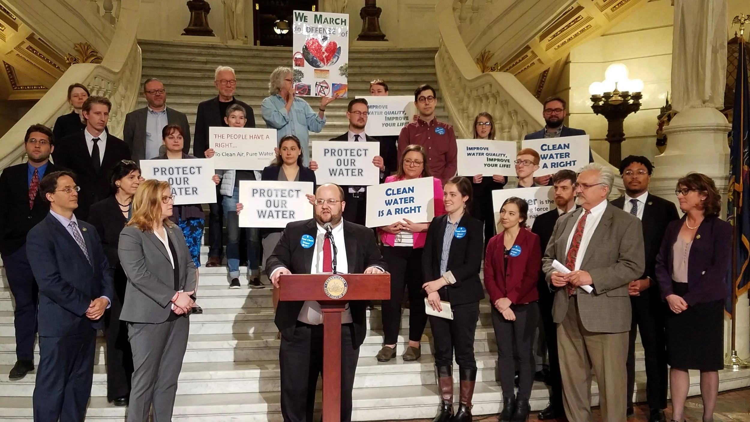 Ezra speaking at the State House in May 2019