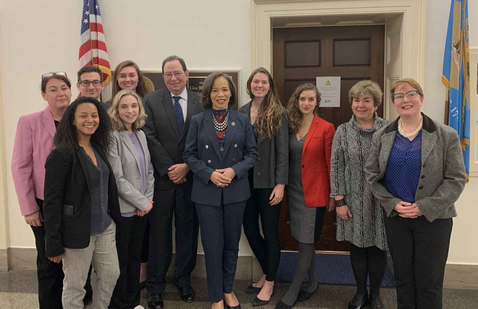Representative Lisa Blunt Rochester poses with the Coalition for the Delaware River Watershed, Choose Clean Water Coalition, American Sustainable Business Council, National Parks Conservation Association, Partnership for the Delaware Estuary, and Delaware Nature Society.