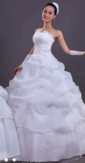  This is a ballgown with beading at waistline. The napkin fold bodice is very flattering. The neckline sits close on the body and fans over the decollete. &nbsp;&nbsp;For a fuller skirt wear a hoop underneath, for a more slender fit, leave the hoop o