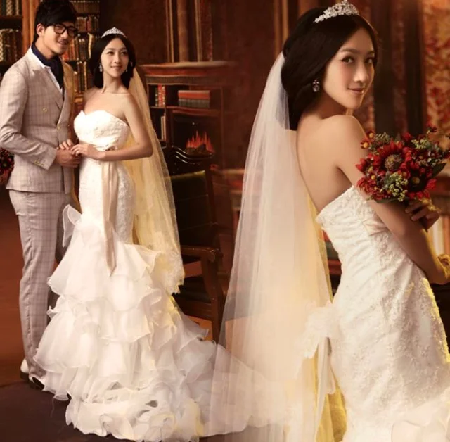  This dress is fantastic. It is a mermaid with a ruffled train, and is &nbsp;hand beaded. 