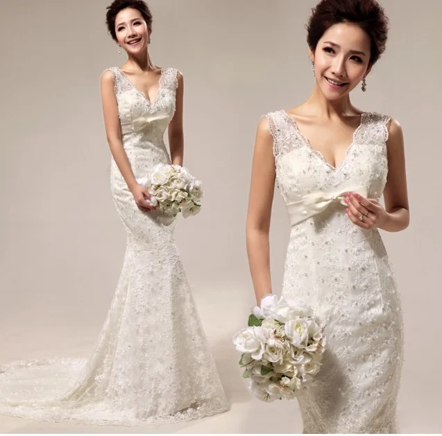  This gown is a hand beaded, mermaid that has a slight flare, If you want it to fit more like a sheath, don't wear a hoop underneath.&nbsp; 