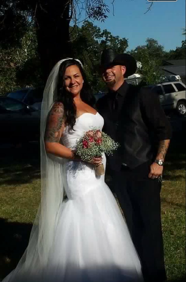  This is an elegant mermaid style dress. It has classic clean lines.&nbsp;The fabric is a soft tulle. If you want to add some sparkle, do it with a jeweled belt, crystal jewelry and a veil with crystals/ appliques/ beading. 