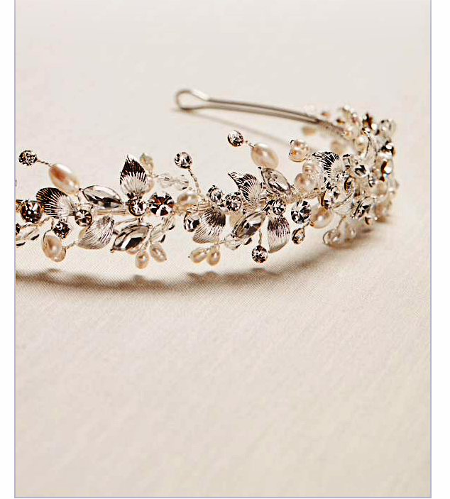  This headband sells for $129 at Kohl's. It is free at Teresa's for the bride's hair. Wear it on a slight forward tilt for more of a crown/tiara look. 