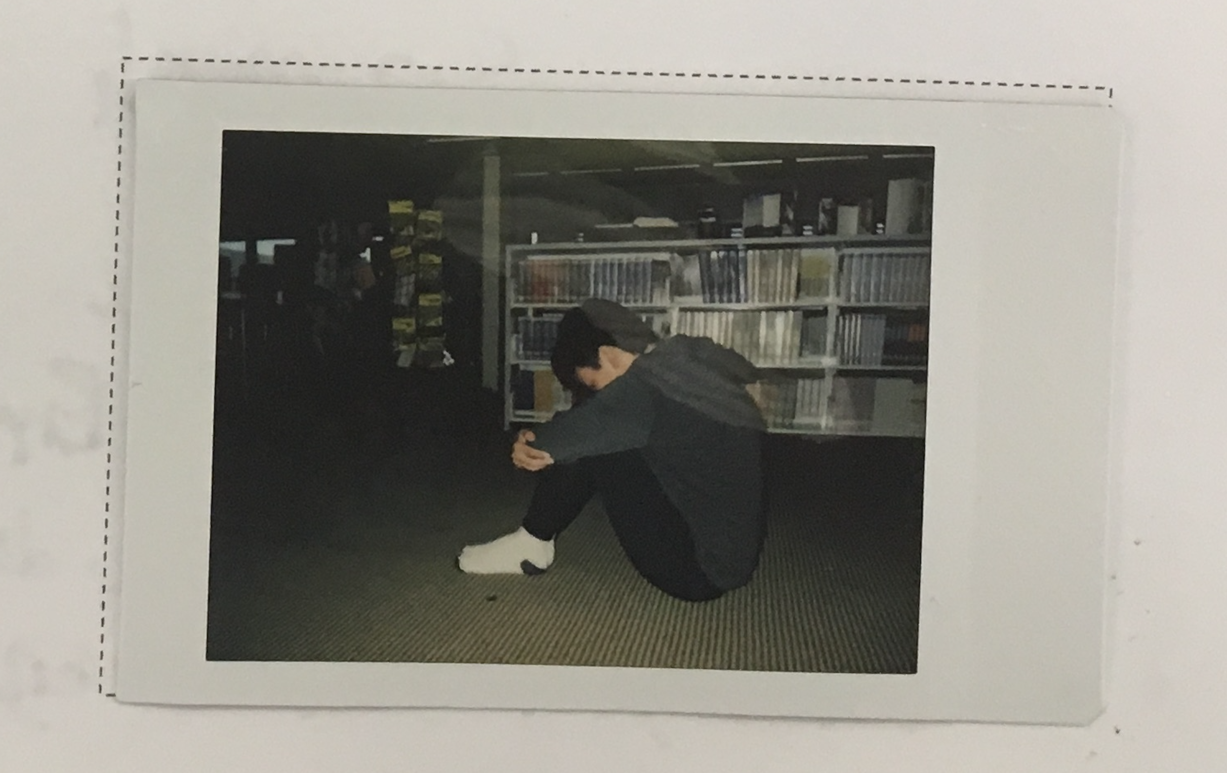 Students create "postcards" to themselves using a polaroid.