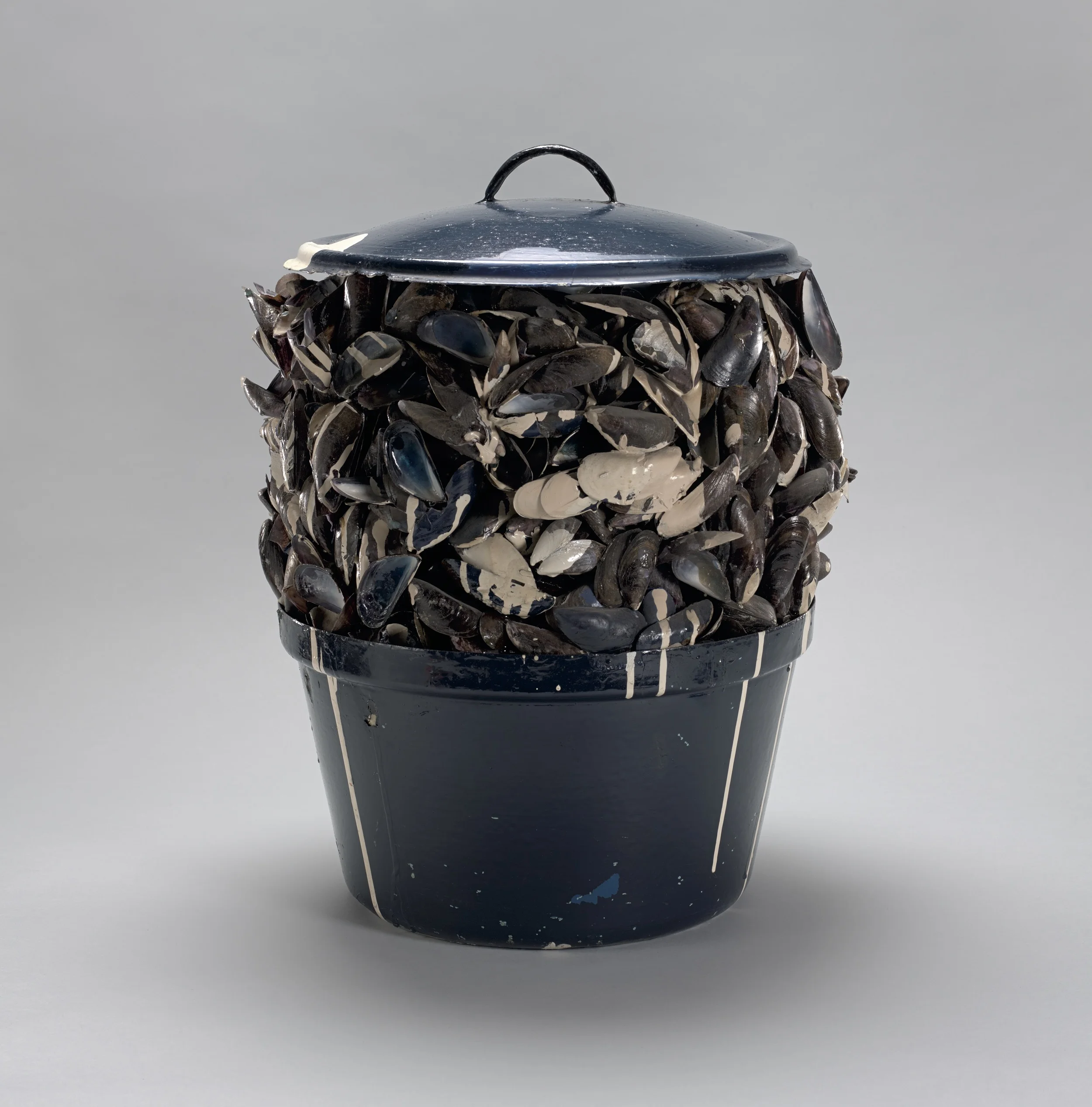 Marcel Broodthaers (Belgian, 1924–1976). Moules sauce blanche (Mussels with white sauce). 1967. Painted pot, mussel shells, paint, and tinted resin, 14 3/4 in. (37.5 cm) diam.; 19 1/8 in. (48.5 cm) high. Private collection, New York. © 2016 Estate of Marcel Broodthaers / Artists Rights Society (ARS), New York / SABAM, Brussels