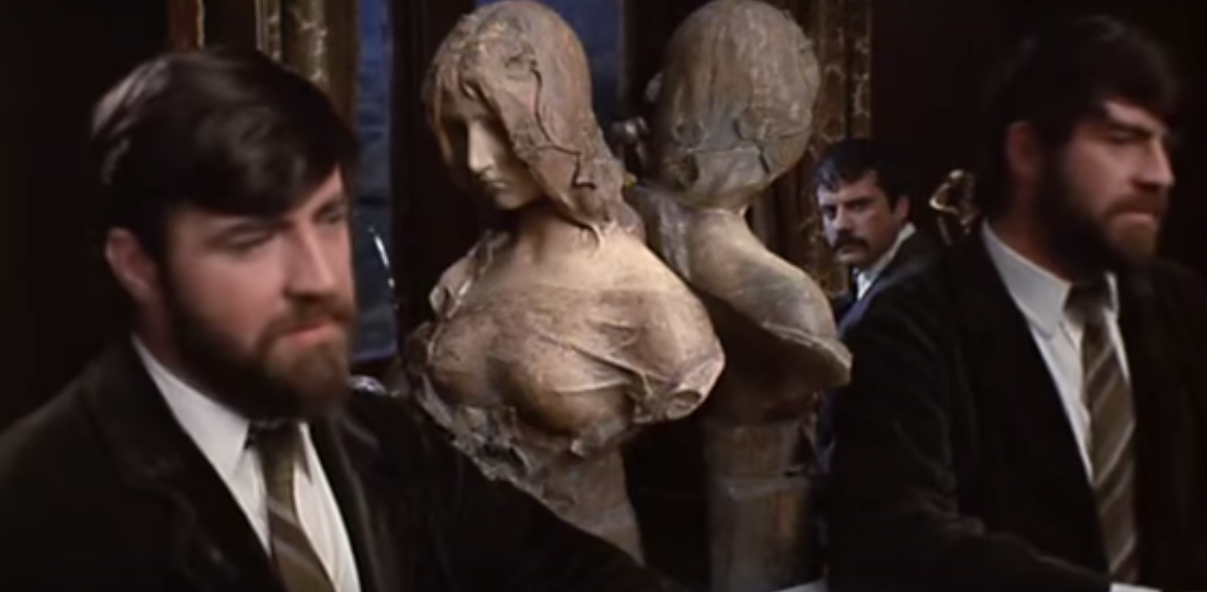 Rupert Birkin (Alan Bates) and Gerald Crich (Oliver Reed) discuss marriage.