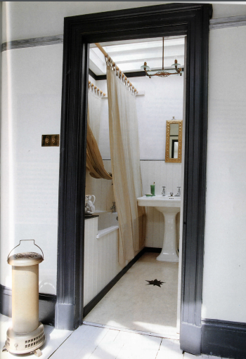 The Bathroom, with its own skylight, oval art nouveau basin and pale yellow Marmoleum floor with star insert by John-Paul.