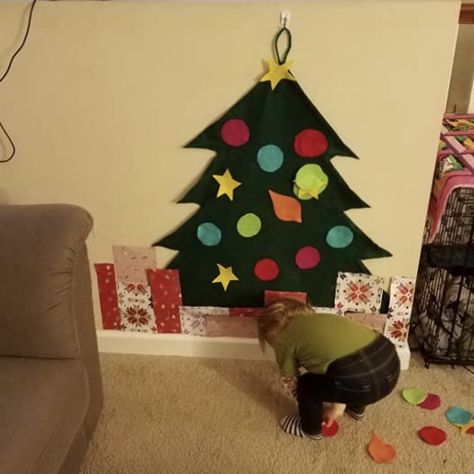 Doula Kara’s youngest, Sable, with her felt tree.