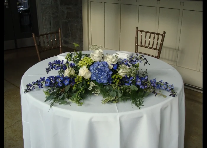 blue-white-and-green-sweetheart-table-centerpiece_8045927765_o.jpg