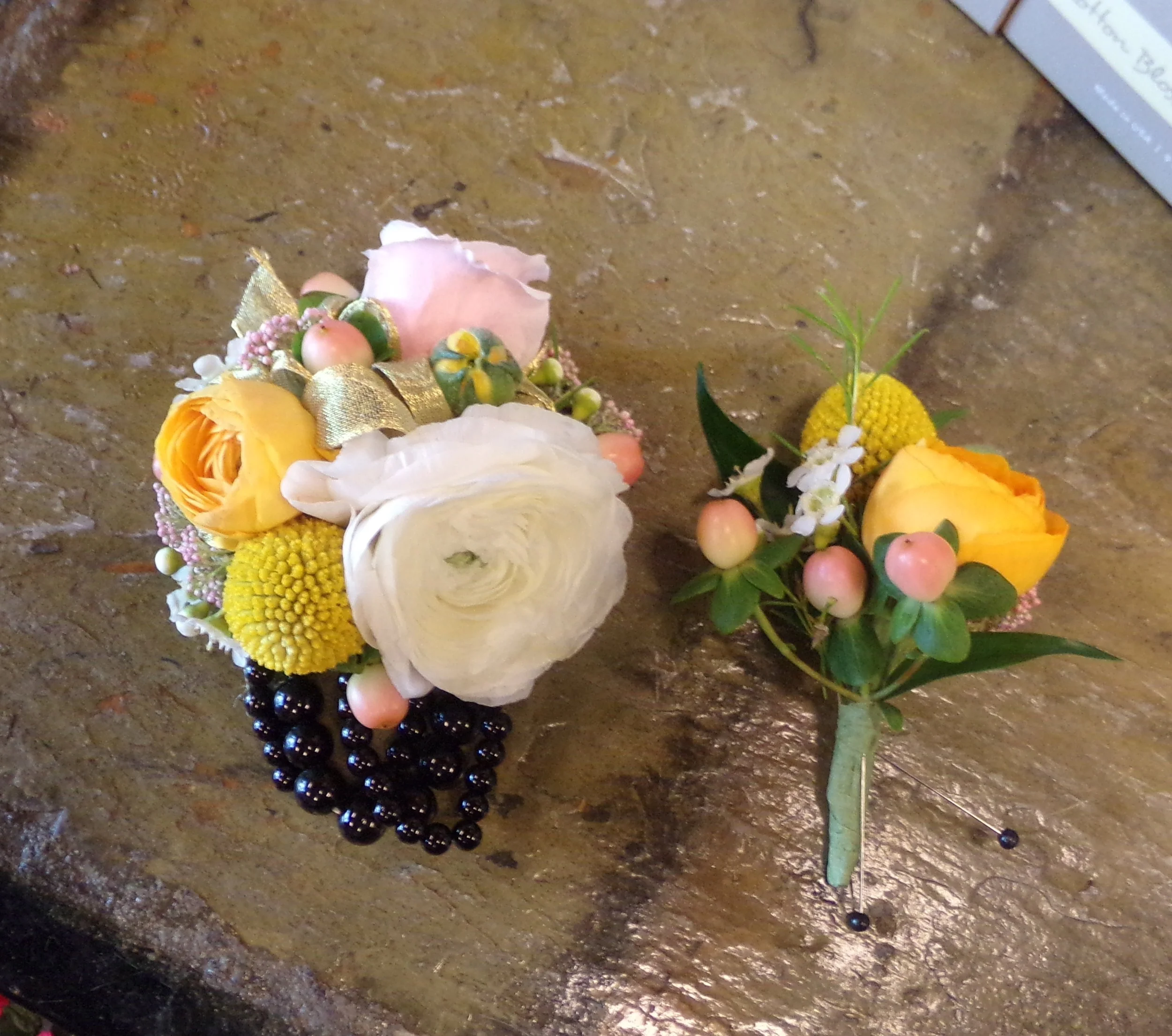 wrist corsage and matching boutonniere april 2016.jpg