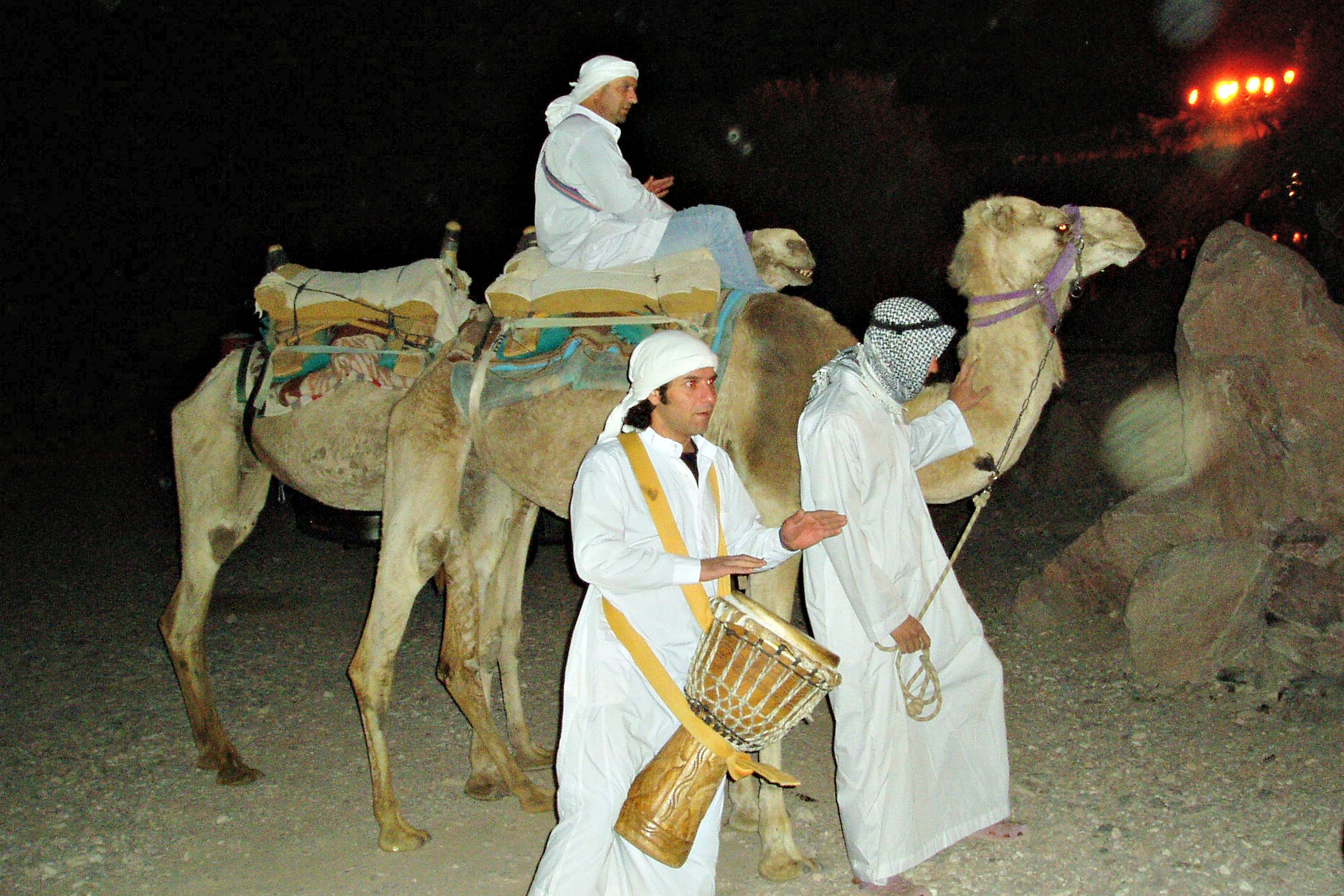 P3140114 Camels and minders who led IMBC participants to banquet in the desert.jpg