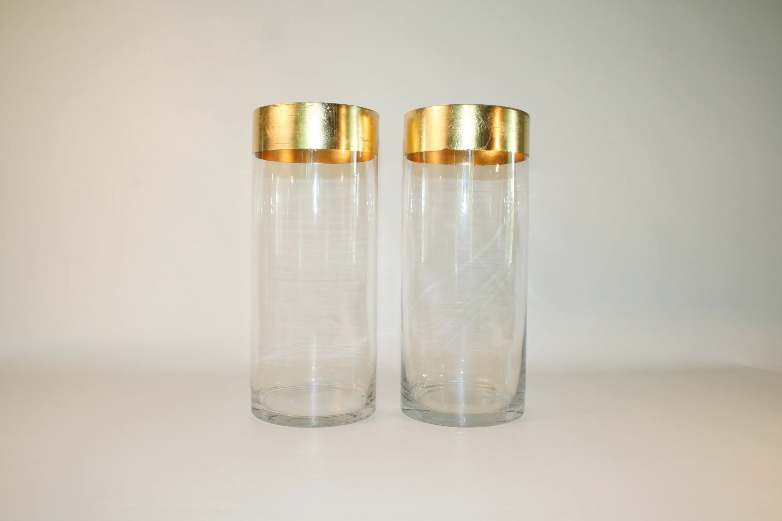 gold leafed glass cylinder