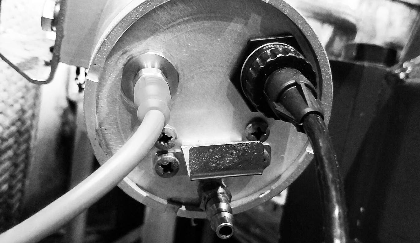 Closeup of the custom ECS camera enclosure with timed air cleaning functionality