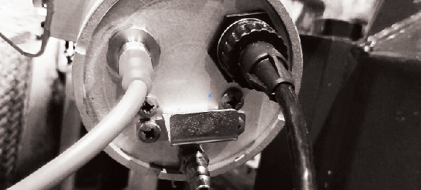 Closeup of the custom ECS camera enclosure with timed air cleaning functionality.