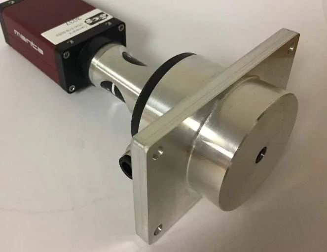 Retrofit pinhole insert allows use of standard pinhole lenses and cameras