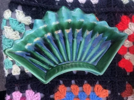 green dish on afghan.JPEG