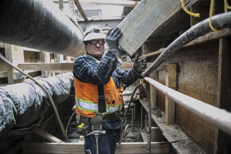 2nd avenue train station tunnel worker Industrial photography by corporate photographer Michael Benabib.JPG