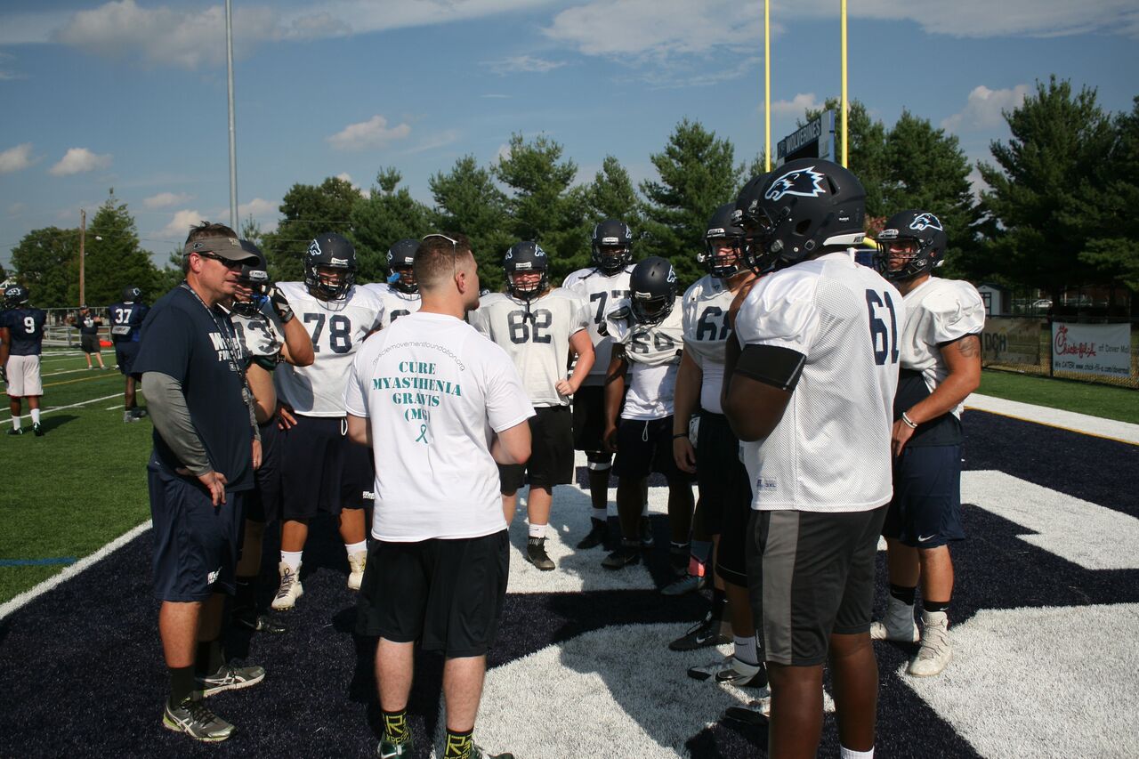 MMF Founder, Rob DeMasi, speaking to a group of players at Thursday's practice. Copyright 2016, Wesley College Athletics.
