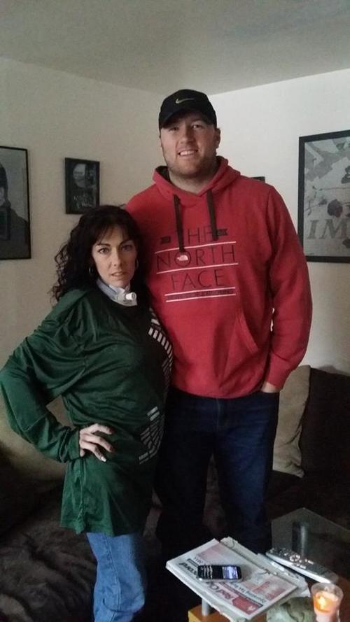 Justin Perillo surprised Marci Williamson at a patient home visit last season. Marci was just weeks out of the hospital after recovering from a Myasthenia Gravis (MG) Crisis. A myasthenia gravis crisis is when one's diaphragm muscles become too weak for the patient to breathe on their own. Justin delivered a signed Green Bay Packers shirt to Marci to lift her spirits. Marci wears it every football season!