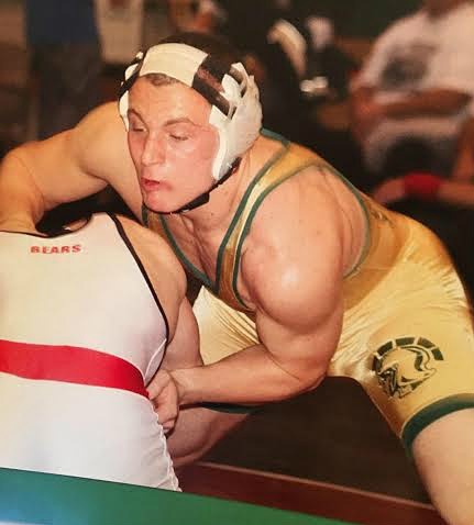 Operating with an undiagnosed form of muscle debilitating disease, Rob DeMasi was ranked honorable mention via USA Wrestling Magazine as a freshman and sophomore. Depicted, DeMasi was undefeated during his junior year, before enduring an injury, and less than one year later was finally properly diagnosed with myasthenia gravis (MG).