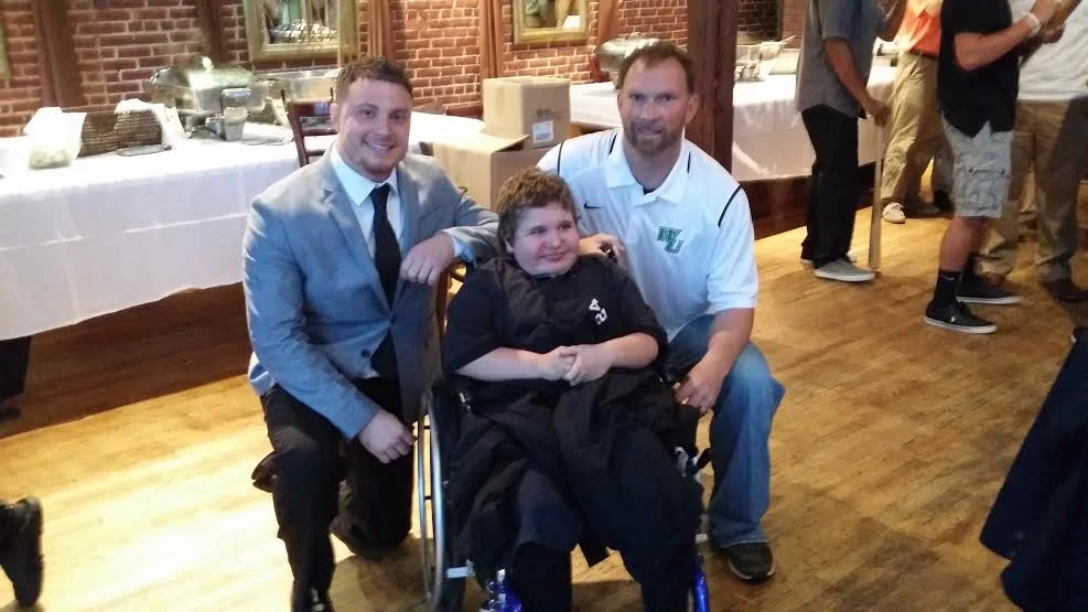 Muscle Movement Fnd. President and WilmU Alumnus, Rob DeMasi, Muscle Champion Eddie Hazeldine, and Wilmington University Head Baseball Coach, Brian August at the 2016 end of the year ceremony!