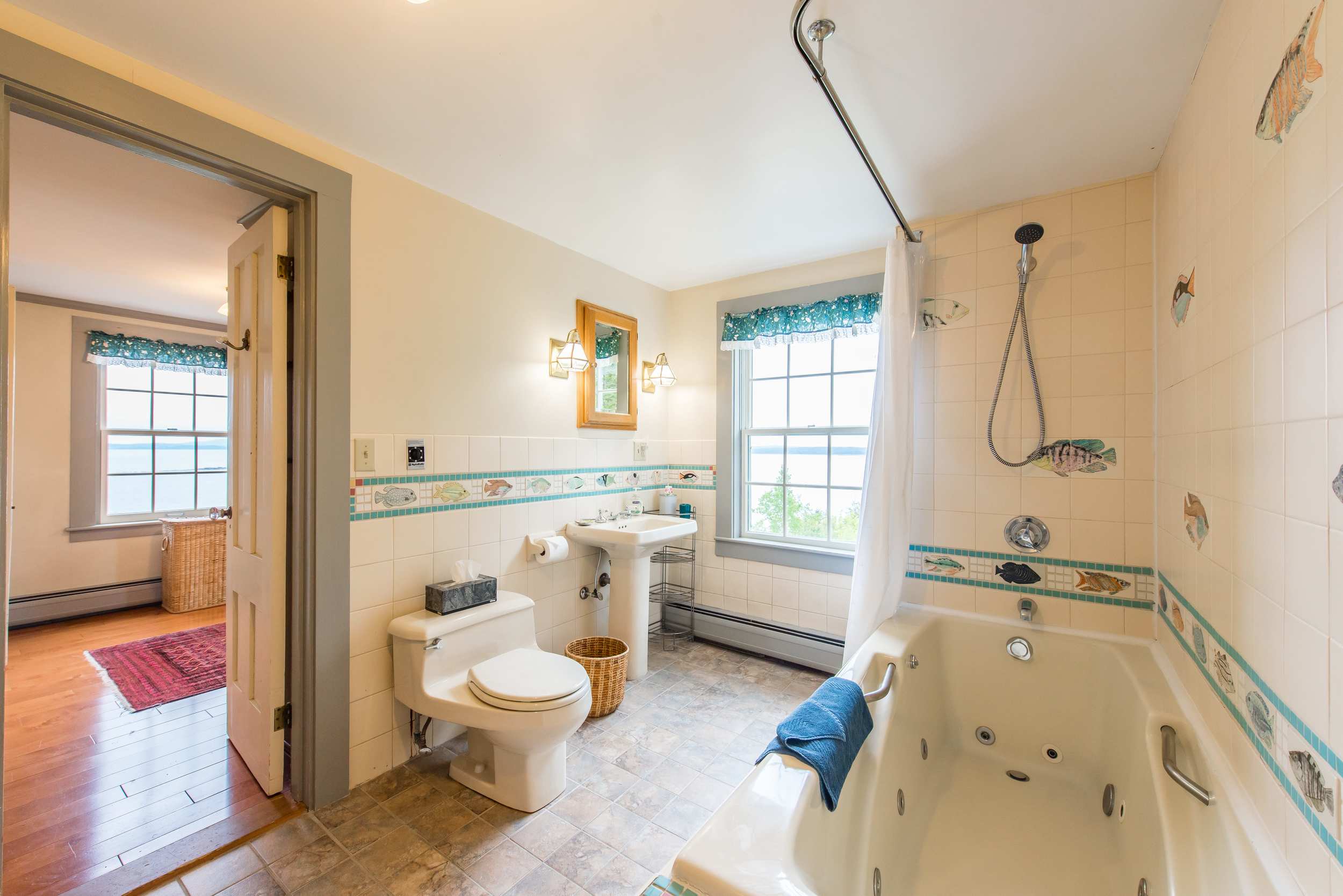  Master suit bathroom with jetted tub, ocean views and hand painted tiles. 