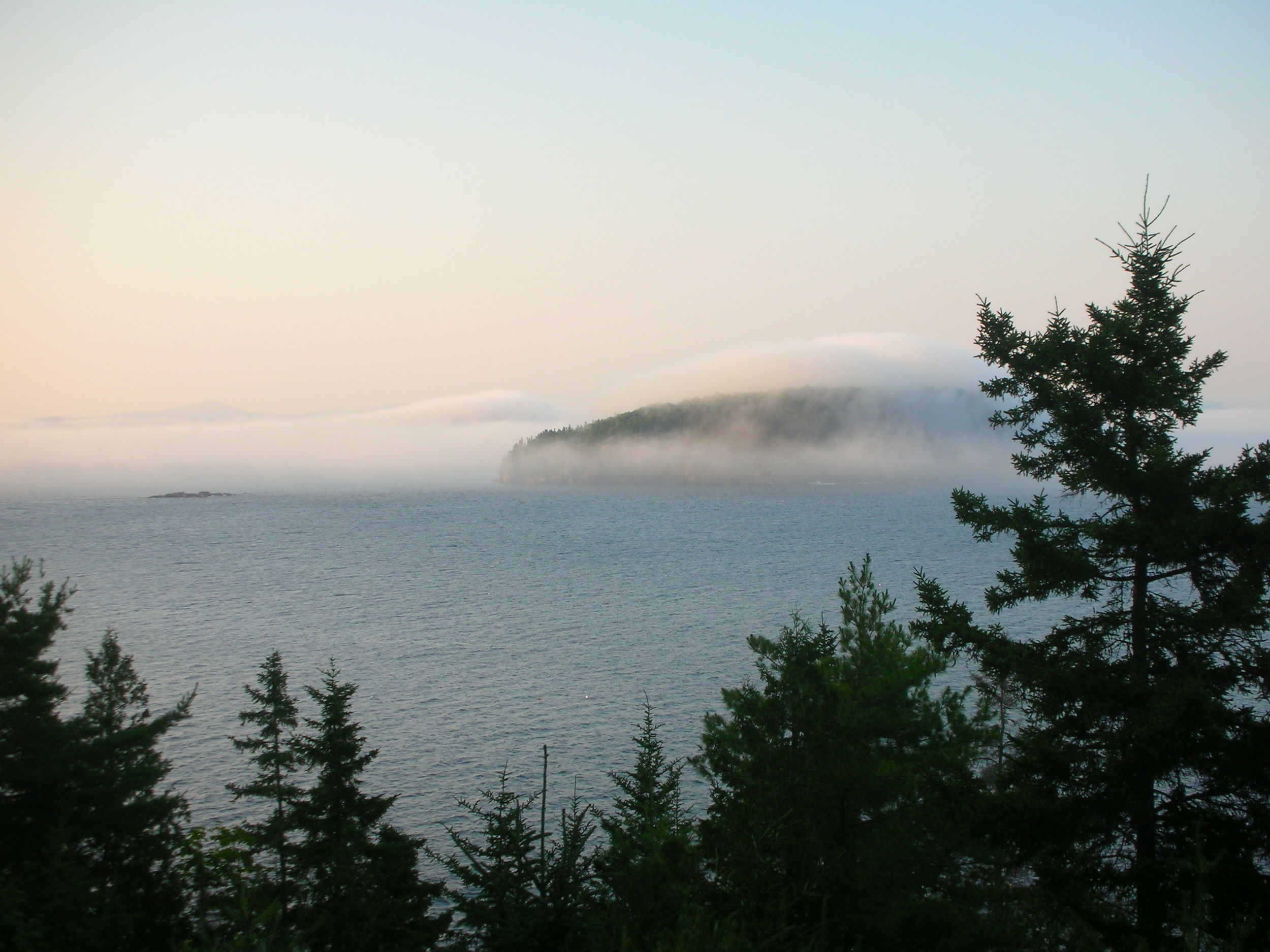  The fog's artistic brush stroke over the Porcupine Islands from the porch. 