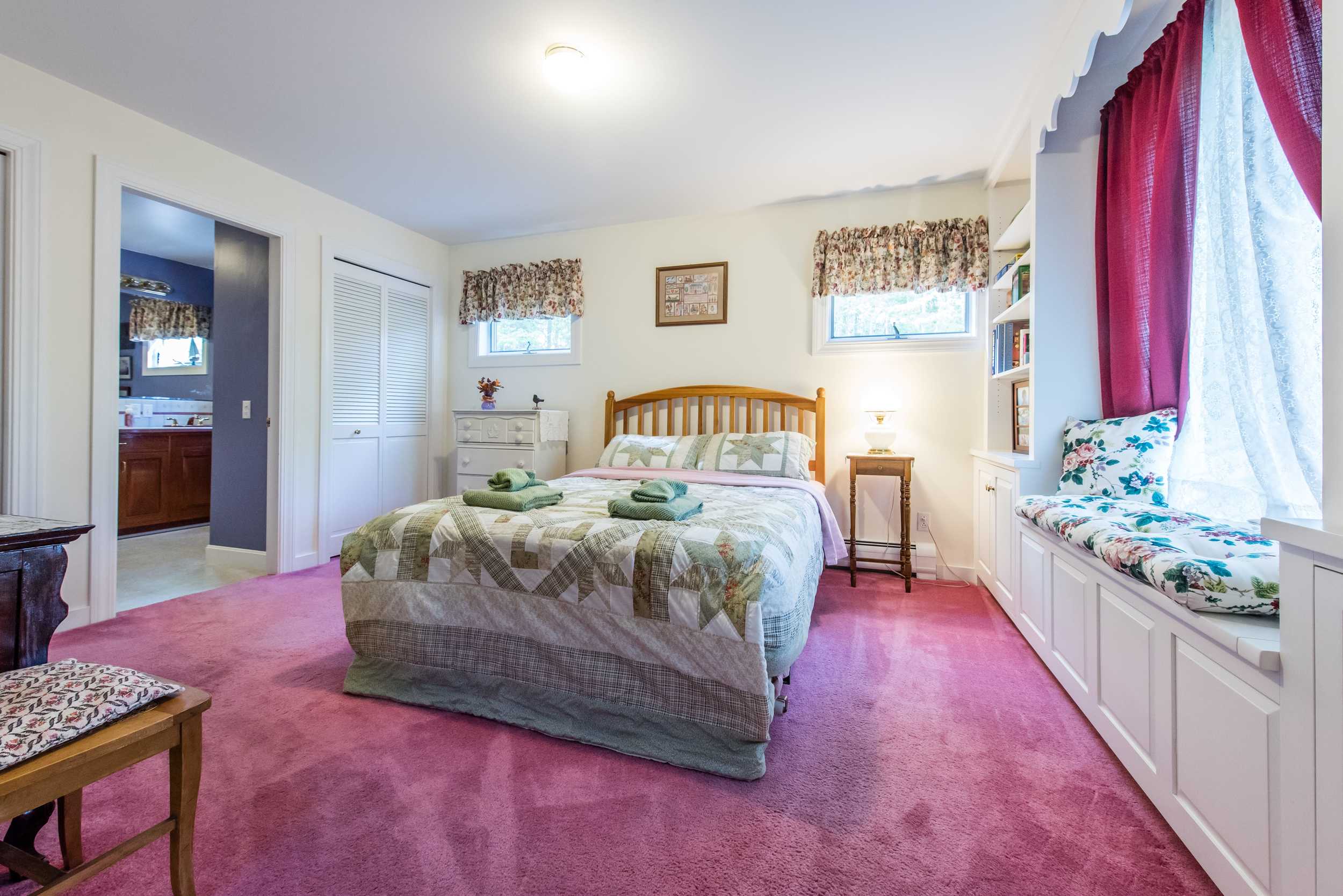  The master suite overlooks Denning Brook and has a private bath. 