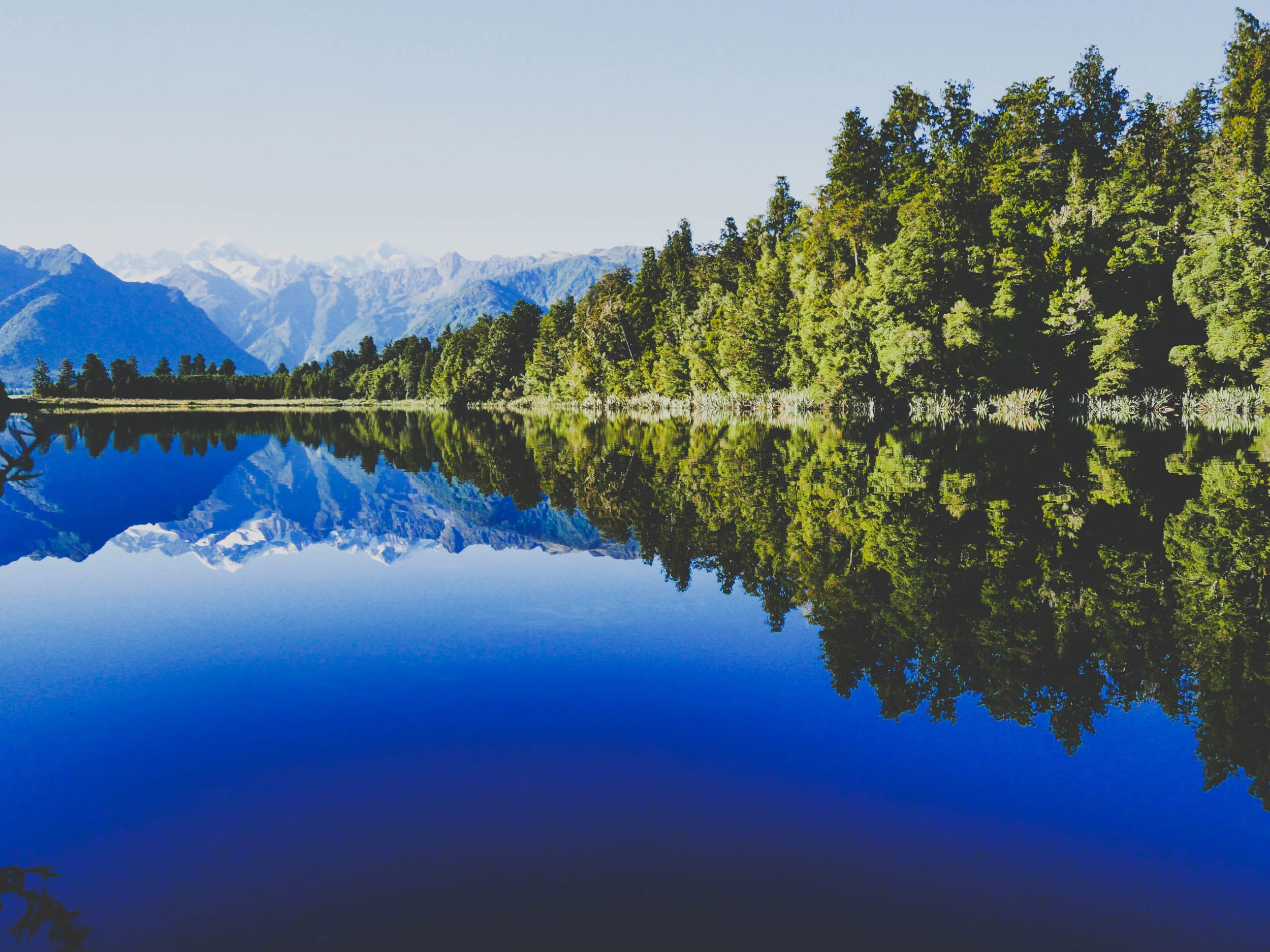 Glassy surface of Lake Matheson