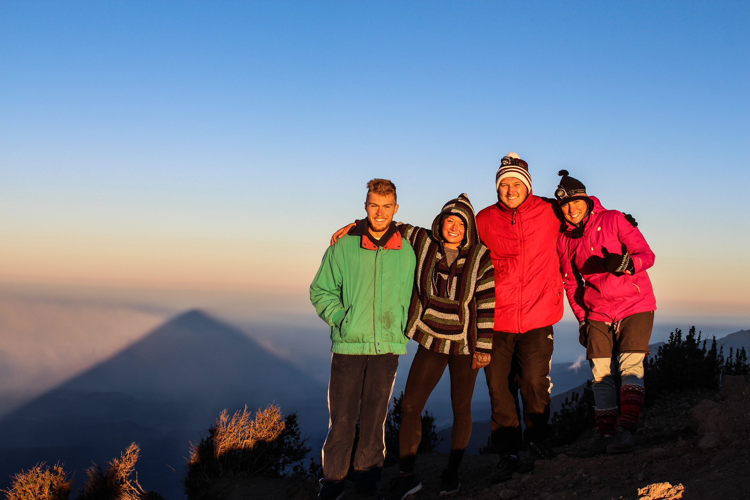 Atop Santa Maria volcano, her shadow looming large in the background