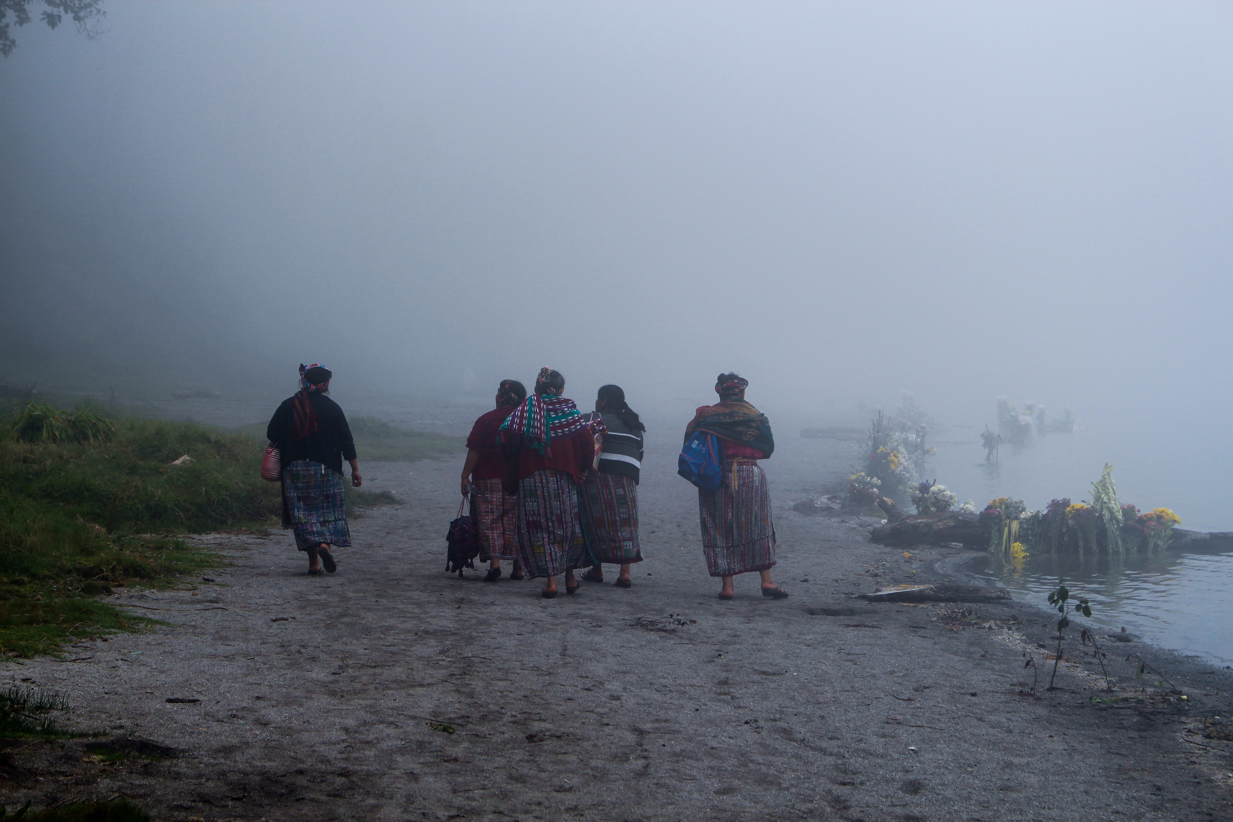 Mayan women return from making an offering at Lake Chicabal