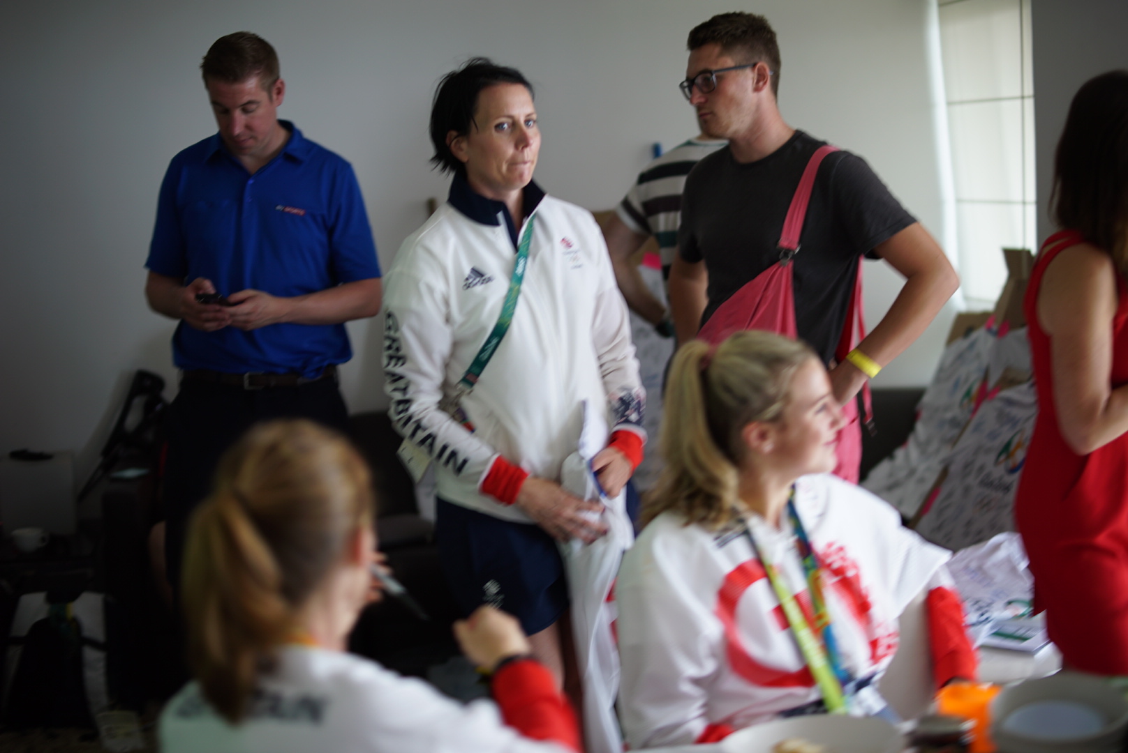 Me being far more interested in the football on telly than the five lovely gold medallists in the room... 